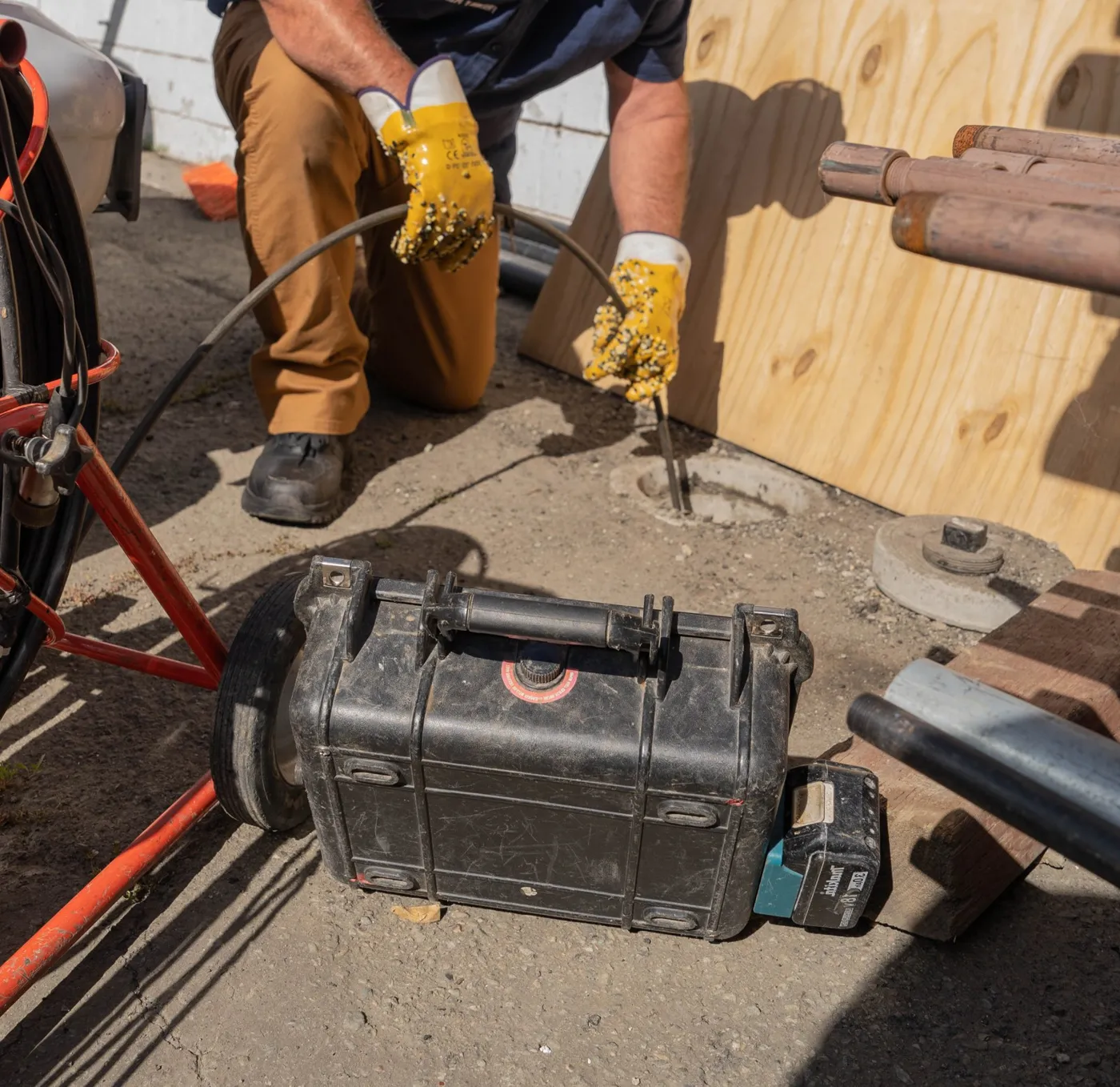 Friendly Services running a sewer camera inspection from the cleanout